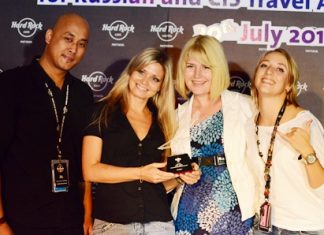 Ian Sutedjo (left) (director of sales and marketing for Hard Rock Hotel Pattaya) and Svetlana Katorgina (right - senior sales manager for Russia & C.I.S. for Hard Rock Hotel Pattaya) present a thank you award to Russian tours guides Lyria and Tatyana from Russian tour company Biblio Globus.